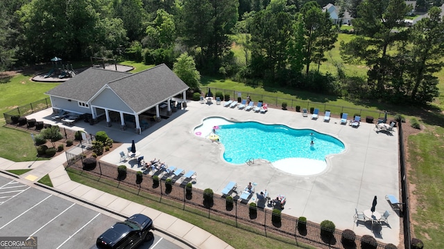 35 Perkins Cv, Senoia, GA 30276 - community pool featuring a patio area