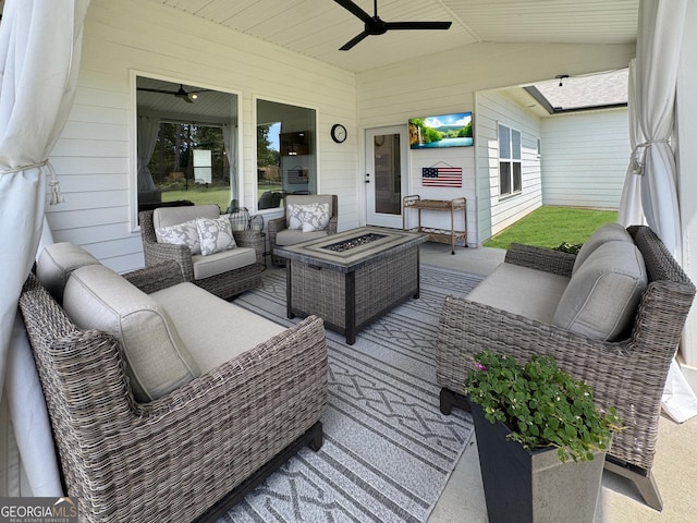 35 Perkins Cv, Senoia, GA 30276 - wooden terrace featuring an outdoor living space with a fire pit and ceiling fan