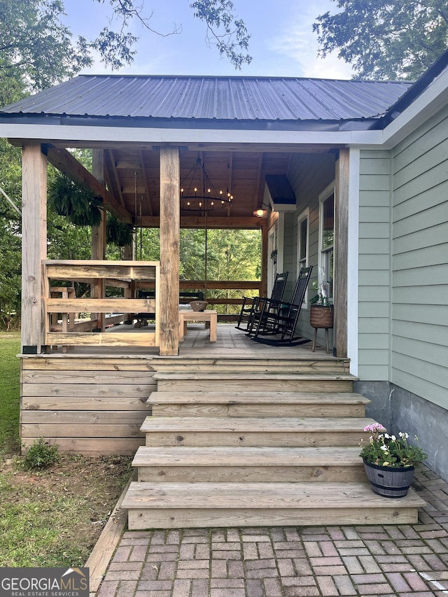 wooden terrace featuring a gazebo