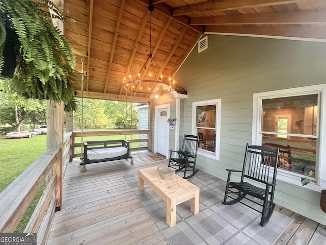 wooden terrace with a porch