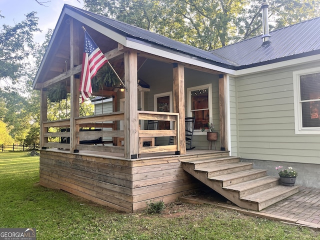 exterior space featuring metal roof