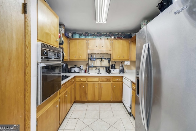 1176 Cardinal Rd NE, Conyers, GA 30012 - kitchen featuring black appliances, light countertops, and light tile patterned floors