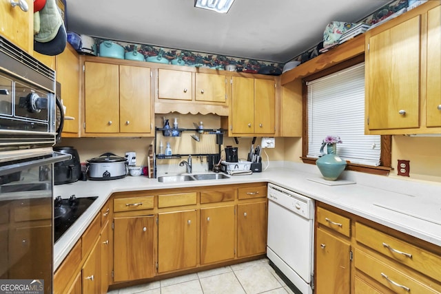 1176 Cardinal Rd NE, Conyers, GA 30012 - kitchen featuring black appliances, light countertops, and light tile patterned floors