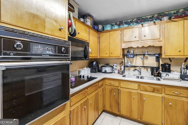 1176 Cardinal Rd NE, Conyers, GA 30012 - kitchen featuring black appliances, light countertops, light tile patterned floors, and brown cabinets