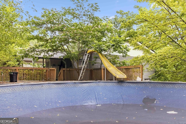 1176 Cardinal Rd NE, Conyers, GA 30012 - view of pool with a water slide