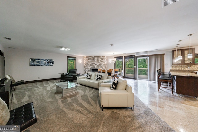 living area featuring a fireplace