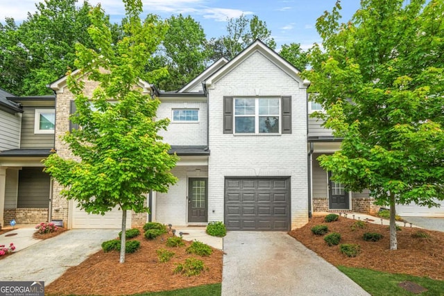 3181 Meadowstone Ln SW, Atlanta, GA 30331 - view of front of home with concrete driveway, a garage, and brick siding