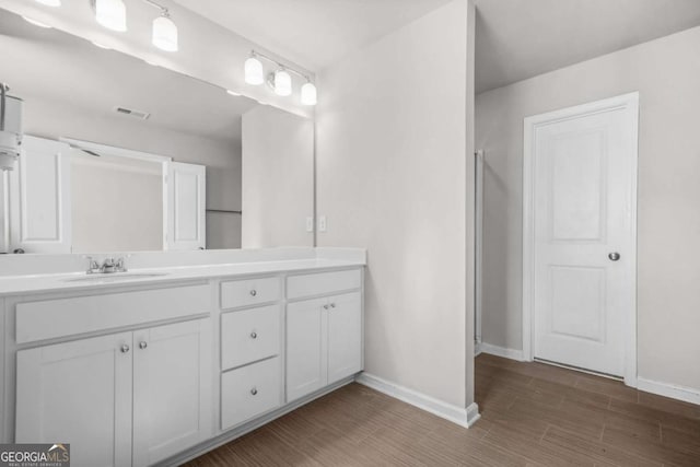 3181 Meadowstone Ln SW, Atlanta, GA 30331 - full bath featuring baseboards, vanity, and an enclosed shower