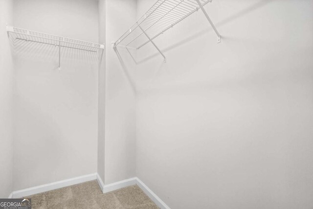 3181 Meadowstone Ln SW, Atlanta, GA 30331 - spacious closet featuring carpet flooring