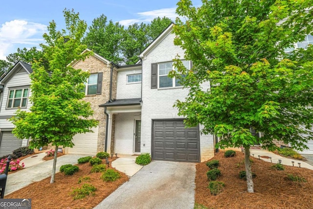 3181 Meadowstone Ln SW, Atlanta, GA 30331 - view of front of property with concrete driveway, a garage, and brick siding