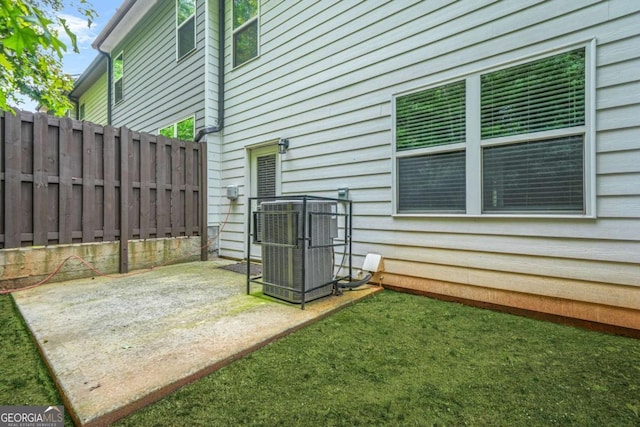 3181 Meadowstone Ln SW, Atlanta, GA 30331 - view of yard with fence, a patio area, and central AC unit