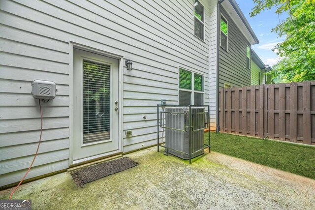 3181 Meadowstone Ln SW, Atlanta, GA 30331 - property entrance with fence and cooling unit