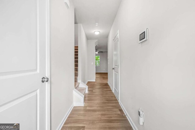 3181 Meadowstone Ln SW, Atlanta, GA 30331 - hall with wood finished floors and baseboards