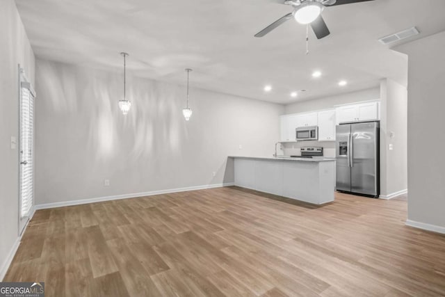 3181 Meadowstone Ln SW, Atlanta, GA 30331 - kitchen featuring stainless steel appliances, a ceiling fan, white cabinetry, baseboards, and recessed lighting