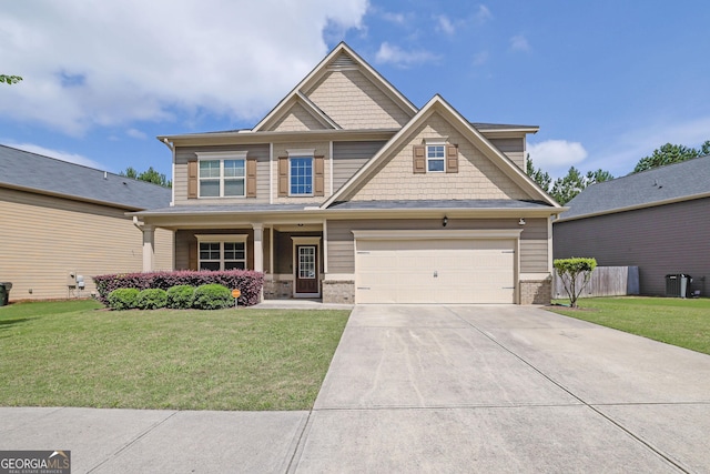 4251 Haywater Cv, Buford, GA 30519 - craftsman-style home featuring brick siding, concrete driveway, central AC, covered porch, and a garage