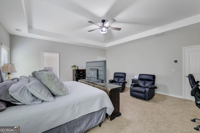 4251 Haywater Cv, Buford, GA 30519 - bedroom with a raised ceiling, light carpet, a ceiling fan, and baseboards