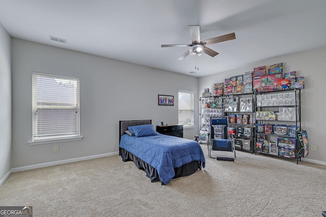 4251 Haywater Cv, Buford, GA 30519 - carpeted bedroom featuring baseboards and ceiling fan