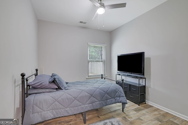 4251 Haywater Cv, Buford, GA 30519 - bedroom featuring light wood-style floors, ceiling fan, and baseboards