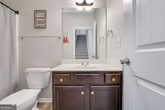 4251 Haywater Cv, Buford, GA 30519 - bathroom with toilet, vanity, and a shower with curtain