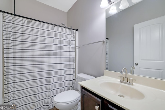 4251 Haywater Cv, Buford, GA 30519 - full bathroom with toilet, vanity, and a shower with curtain