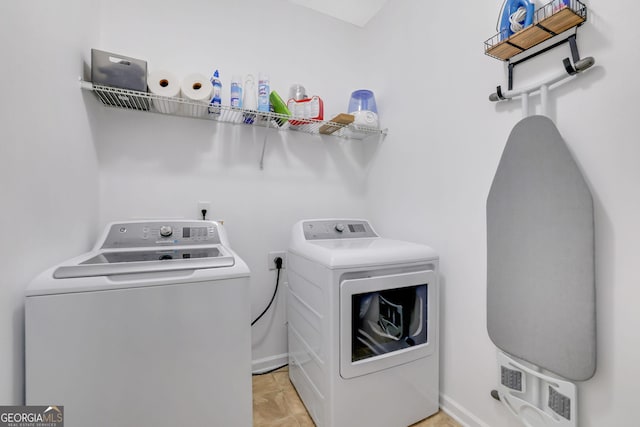 4251 Haywater Cv, Buford, GA 30519 - laundry room with washer and dryer and baseboards