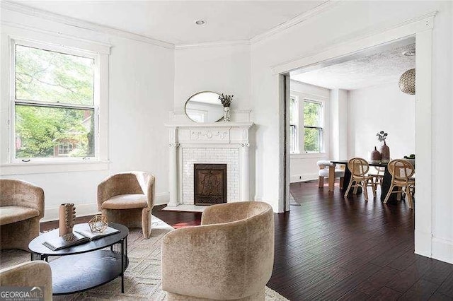 118 Waverly Way, Atlanta, GA 30307 - living room featuring a fireplace with flush hearth, crown molding, wood finished floors, and baseboards
