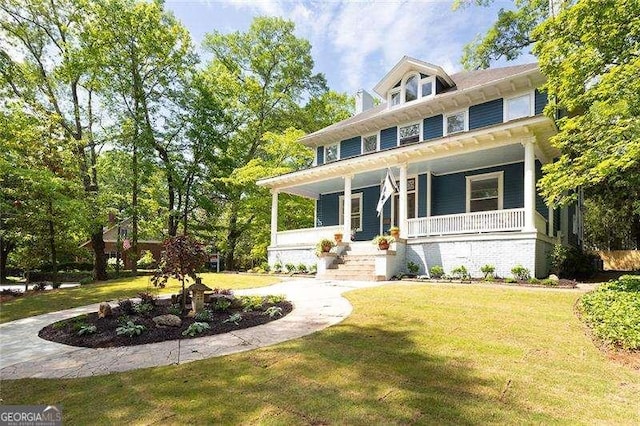 118 Waverly Way, Atlanta, GA 30307 - traditional style home with a front lawn and covered porch