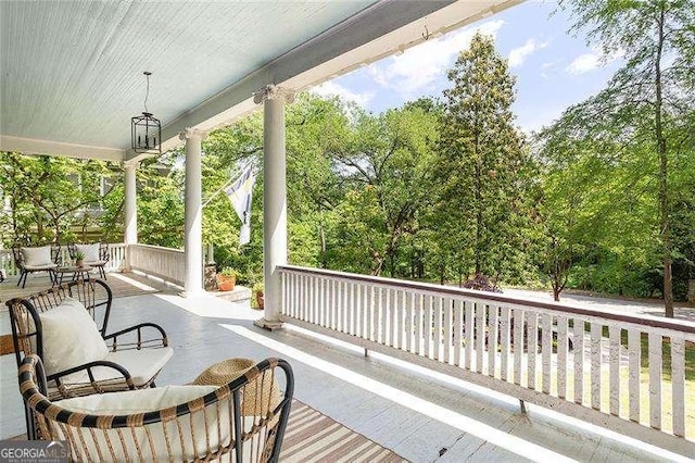 118 Waverly Way, Atlanta, GA 30307 - wooden deck featuring covered porch
