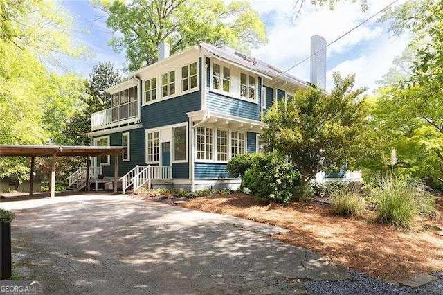 118 Waverly Way, Atlanta, GA 30307 - front of property featuring a chimney and driveway
