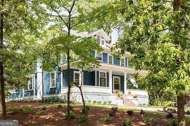 118 Waverly Way, Atlanta, GA 30307 - view of front facade featuring a porch and a chimney