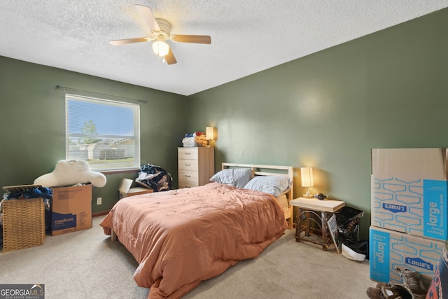 127 Fairfield Dr, Saint Marys, GA 31558 - carpeted bedroom featuring a textured ceiling and ceiling fan