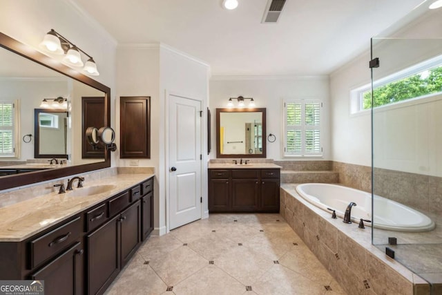 2165 Mcfarlin Ln, Alpharetta, GA 30004 - full bath with crown molding, a garden tub, two vanities, and tile patterned floors