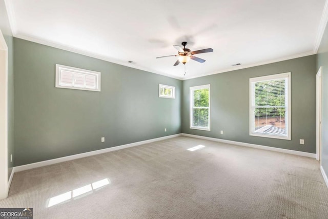 2165 Mcfarlin Ln, Alpharetta, GA 30004 - empty room with ornamental molding, carpet, a ceiling fan, and baseboards