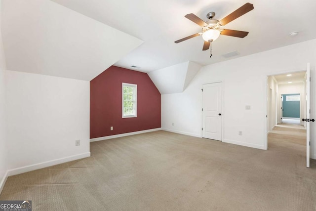 2165 Mcfarlin Ln, Alpharetta, GA 30004 - additional living space featuring a ceiling fan, vaulted ceiling, light carpet, and baseboards