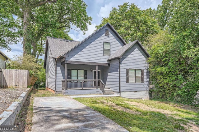 558 Elbridge Dr NW, Atlanta, GA 30318 - bungalow-style house with a porch and roof with shingles