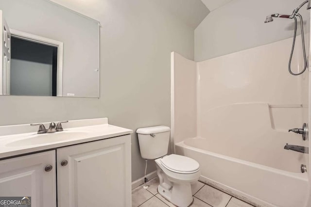 558 Elbridge Dr NW, Atlanta, GA 30318 - full bathroom featuring tile patterned floors, vanity, washtub / shower combination, and lofted ceiling