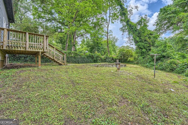 558 Elbridge Dr NW, Atlanta, GA 30318 - view of yard featuring stairway and a deck