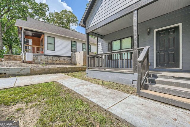 558 Elbridge Dr NW, Atlanta, GA 30318 - property entrance with a porch