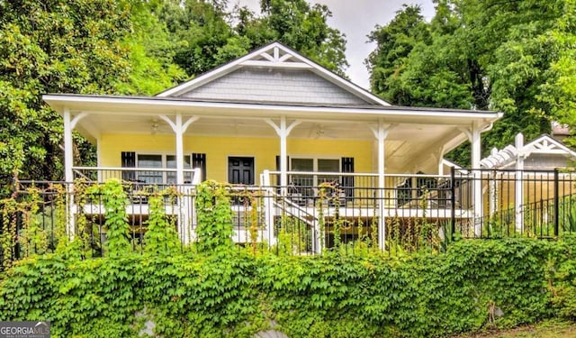 255 S Grove St, Dahlonega, GA 30533 - view of front facade with fence and a porch