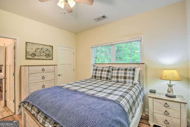 255 S Grove St, Dahlonega, GA 30533 - bedroom featuring light wood finished floors and a ceiling fan