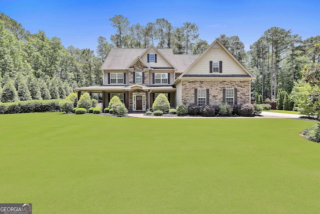 view of front of house featuring a front lawn and a porch