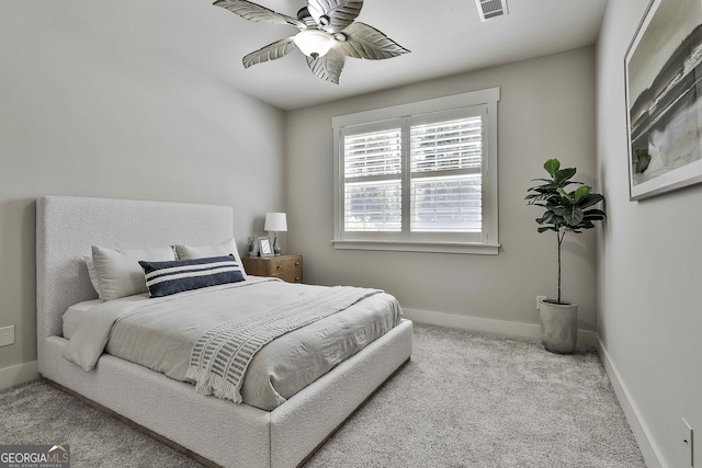 bedroom featuring carpet flooring, baseboards, and a ceiling fan