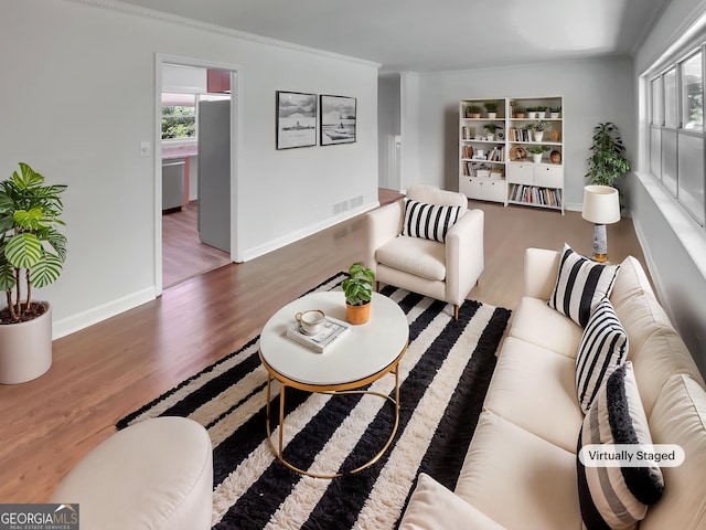 710 Montclair Dr SW, Smyrna, GA 30082 - living room featuring wood finished floors and baseboards