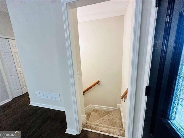 107 Oconnor Dr, Dallas, GA 30157 - staircase featuring wood finished floors and baseboards