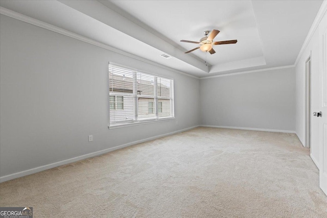 360 Turtle Creek Dr, Winder, GA 30680 - empty room with ceiling fan, carpet flooring, baseboards, a tray ceiling, and ornamental molding