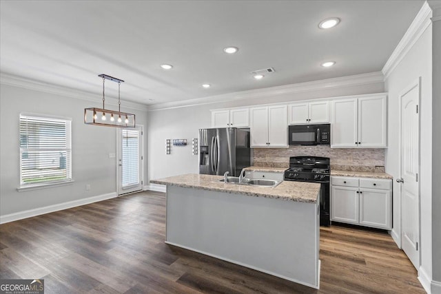 360 Turtle Creek Dr, Winder, GA 30680 - kitchen featuring black appliances, a sink, crown molding, tasteful backsplash, and white cabinets