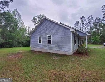 1818 Ga Highway 117, Rentz, GA 31075 - view of property exterior featuring a yard
