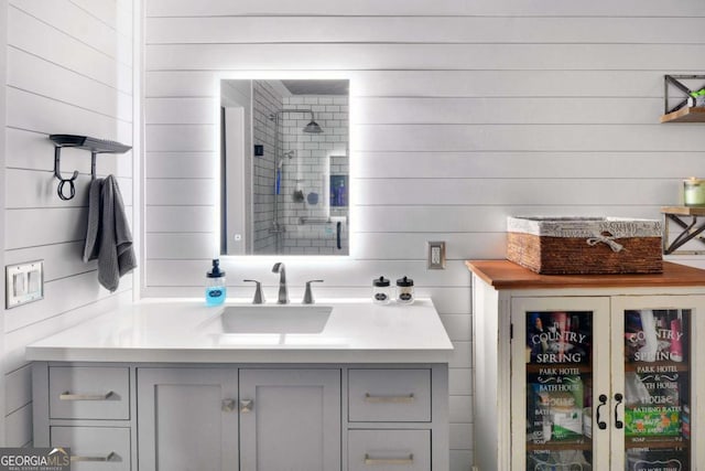 109 Mackqueen Dr, Brunswick, GA 31525 - bathroom with vanity, wood walls, and a shower