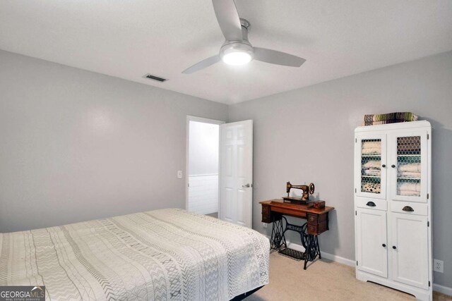 109 Mackqueen Dr, Brunswick, GA 31525 - bedroom featuring light colored carpet, ceiling fan, and baseboards