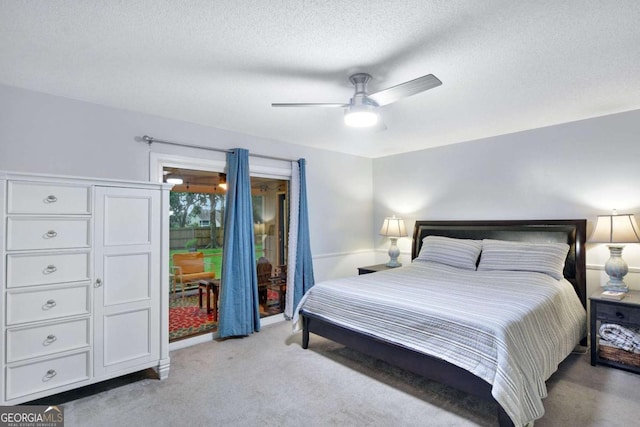 109 Mackqueen Dr, Brunswick, GA 31525 - bedroom with light colored carpet, a textured ceiling, and ceiling fan